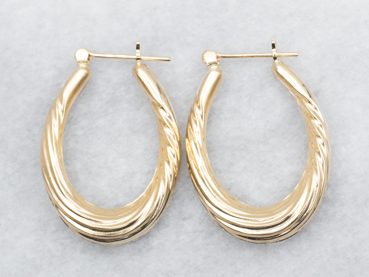 Hollow Oval Twist Hoop Earrings