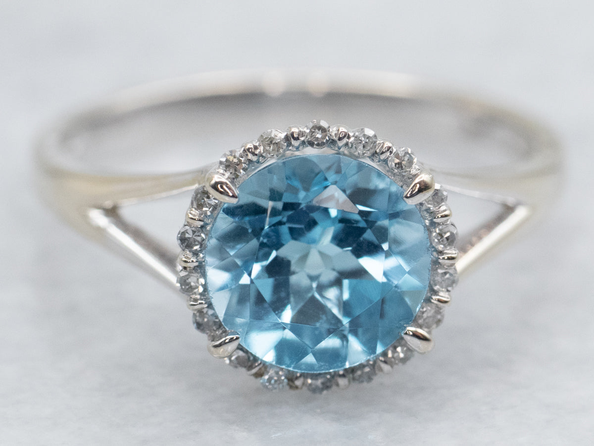 Modern Blue Topaz Ring with Diamond Halo