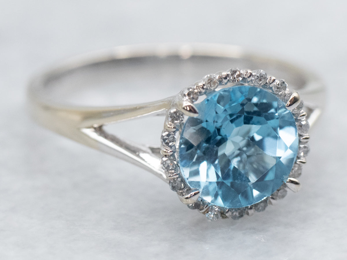 Modern Blue Topaz Ring with Diamond Halo