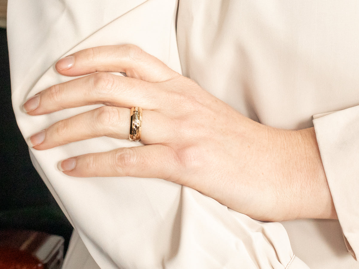Yellow gold twisted wedding band top