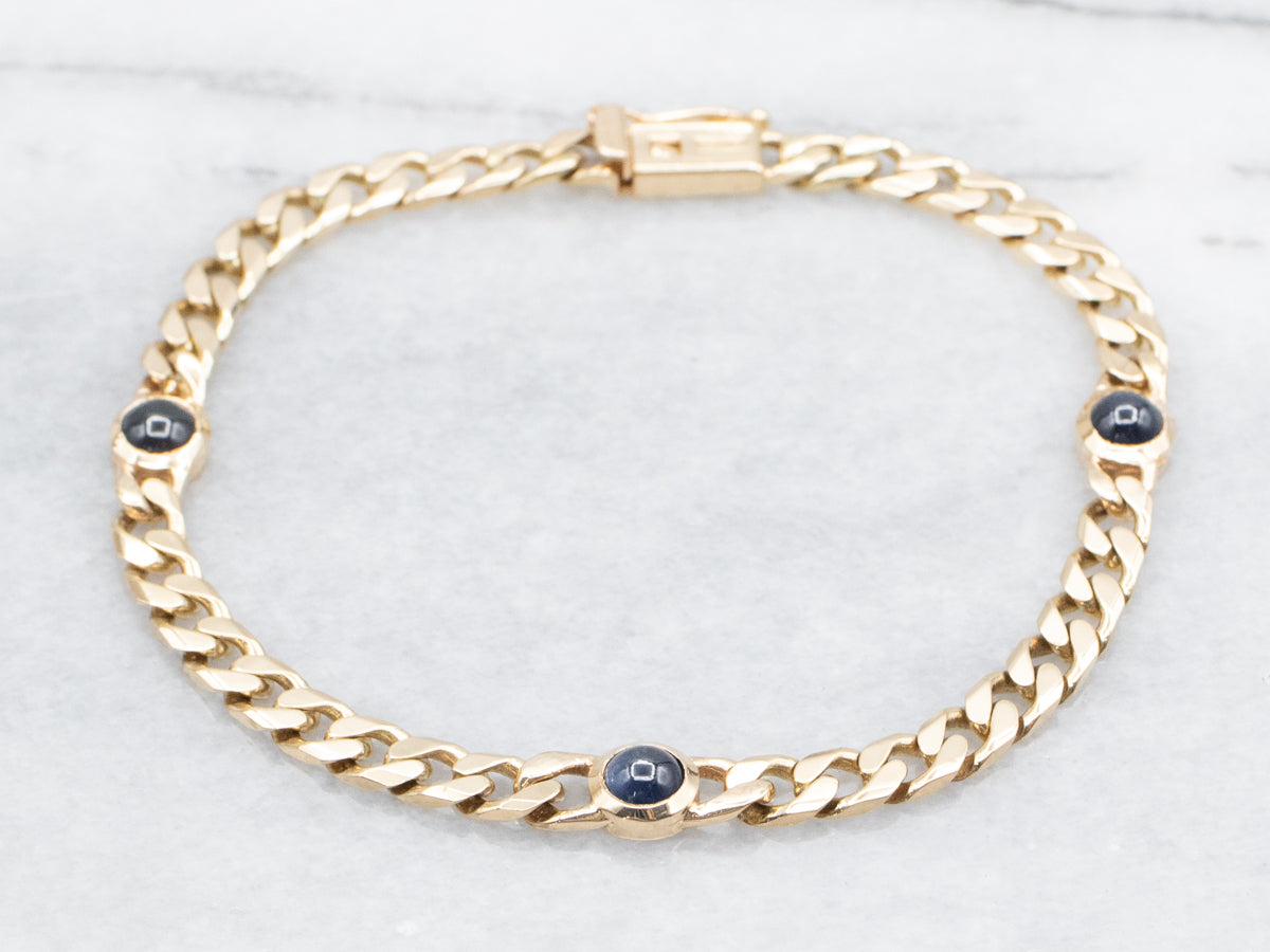 Gold Curb Chain Bracelet with Sapphire Cabochons