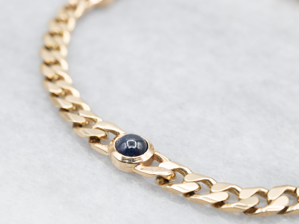 Gold Curb Chain Bracelet with Sapphire Cabochons