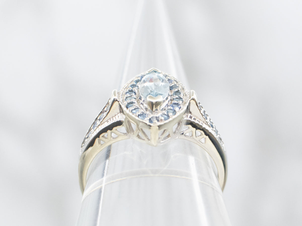 Marquise Cut Aquamarine Ring with Sapphire Halo