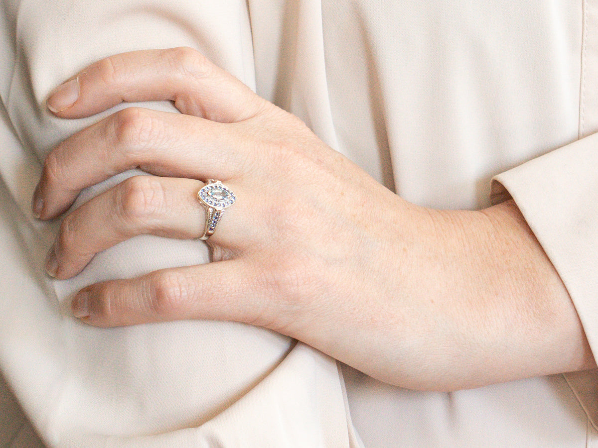 Marquise Cut Aquamarine Ring with Sapphire Halo