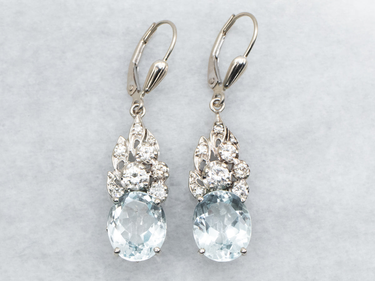 Pendientes colgantes de topacio azul y diamantes