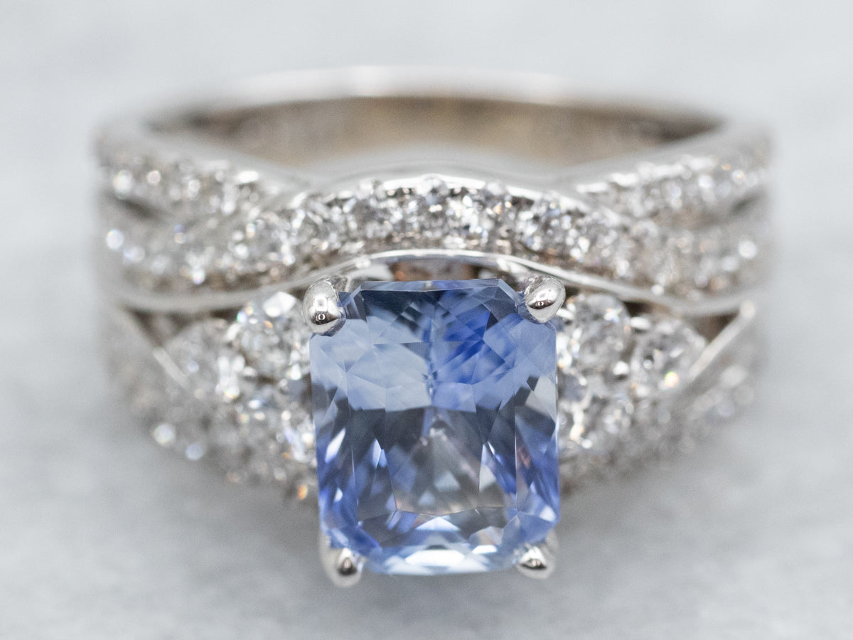 Curved Sapphire and Diamond Engagement Ring