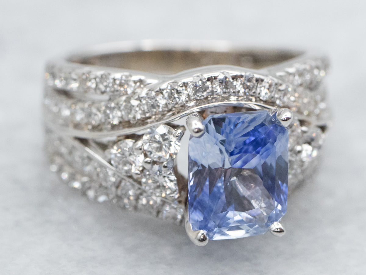 Curved Sapphire and Diamond Engagement Ring