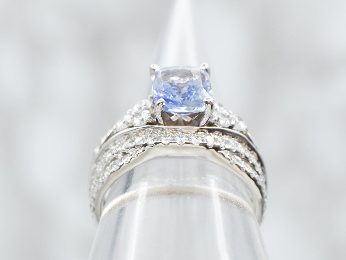 Curved Sapphire and Diamond Engagement Ring