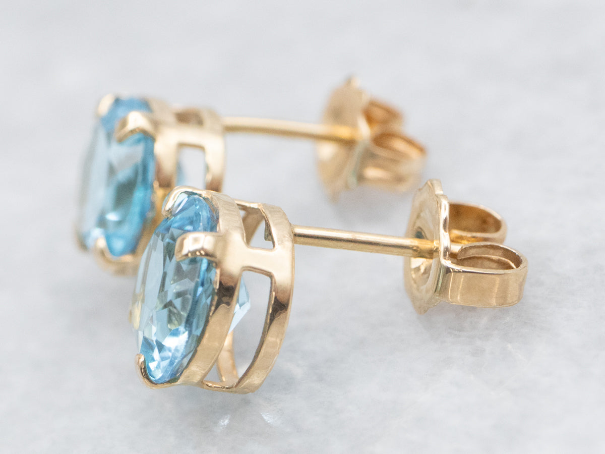 Yellow Gold Blue Topaz Stud Earrings