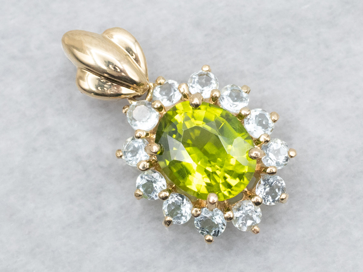 Colgante de Oro Amarillo con Peridoto y Halo de Aguamarina