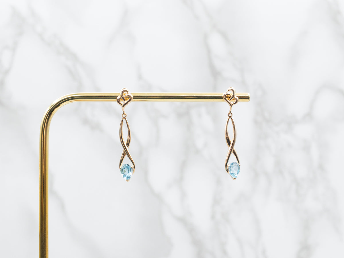 Twisting Gold Blue Topaz Drop Earrings