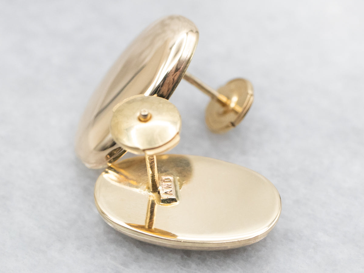 Polished Oval Gold Stud Earrings