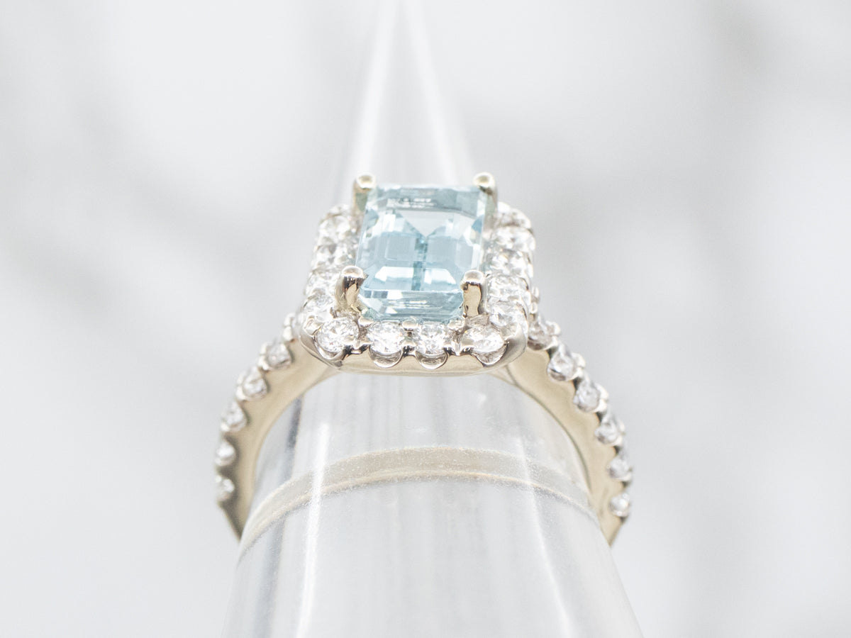 Modern Aquamarine Ring with Diamond Halo