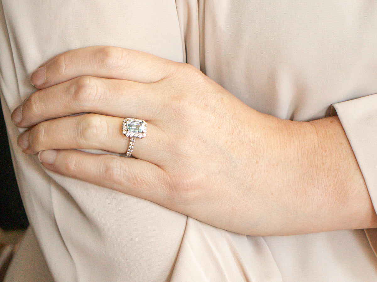 Modern Aquamarine Ring with Diamond Halo