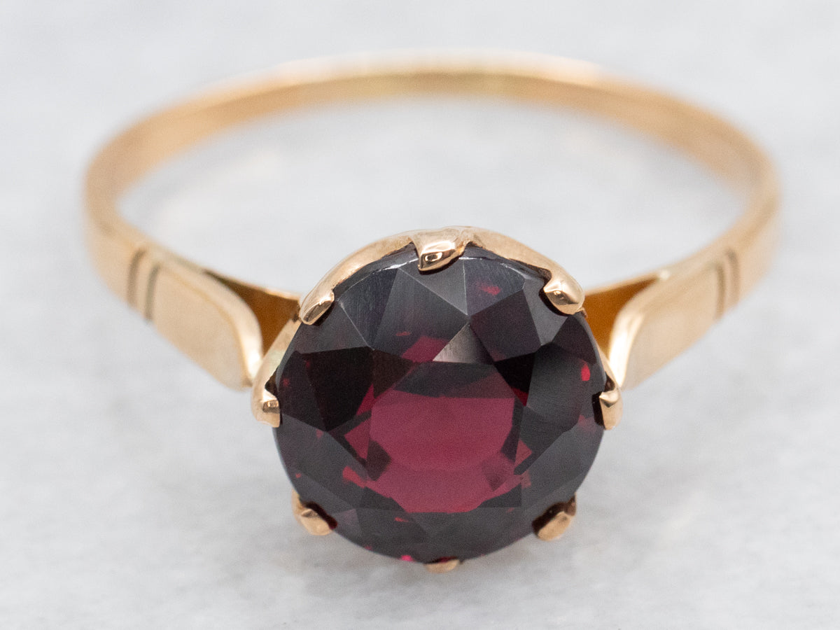 Garnet Solitaire Ring set in Vintage Gold Mounting