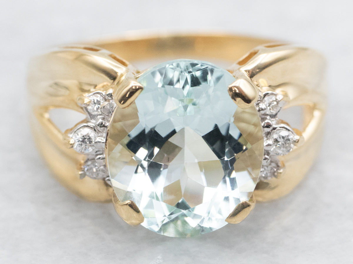 Modern Gold Aquamarine and Diamond Ring