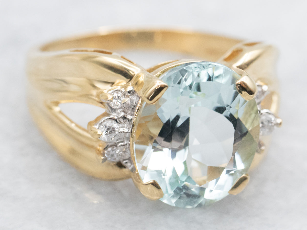 Modern Gold Aquamarine and Diamond Ring