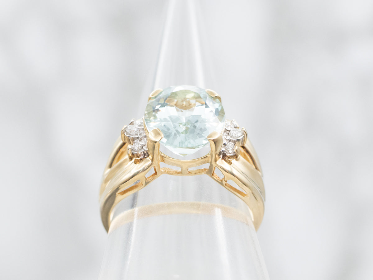 Modern Gold Aquamarine and Diamond Ring