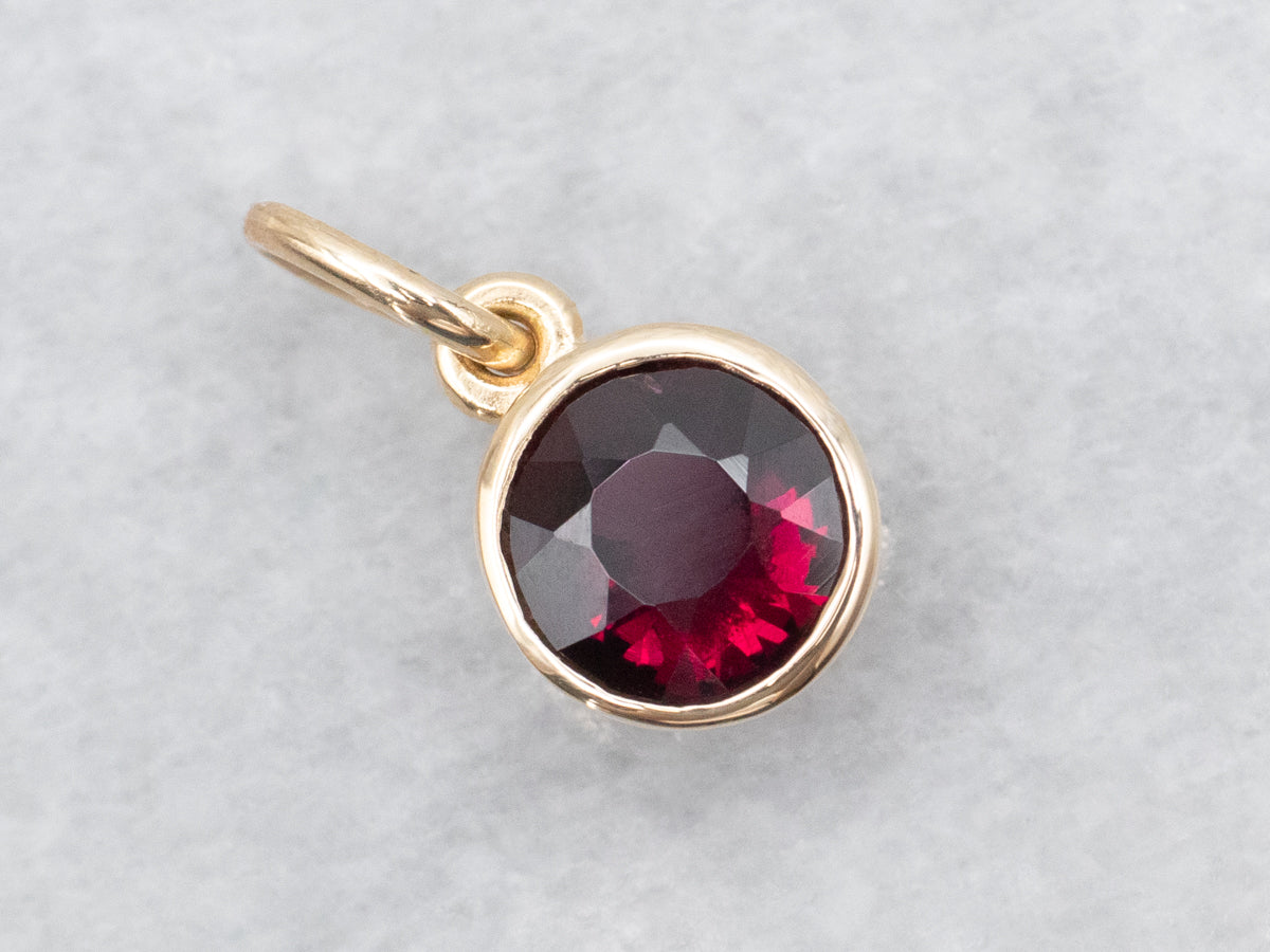 Gold Bezel Set Round Garnet Solitaire Pendant