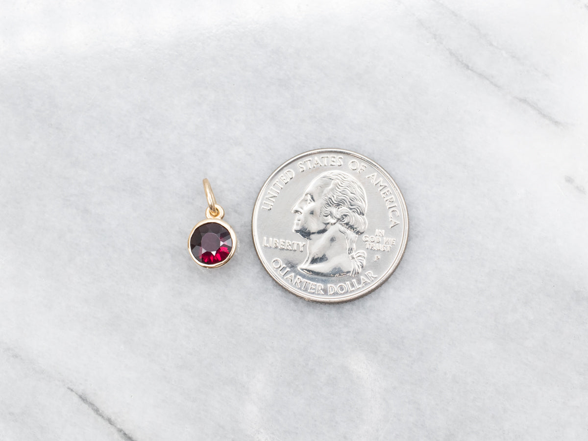 Gold Bezel Set Round Garnet Solitaire Pendant