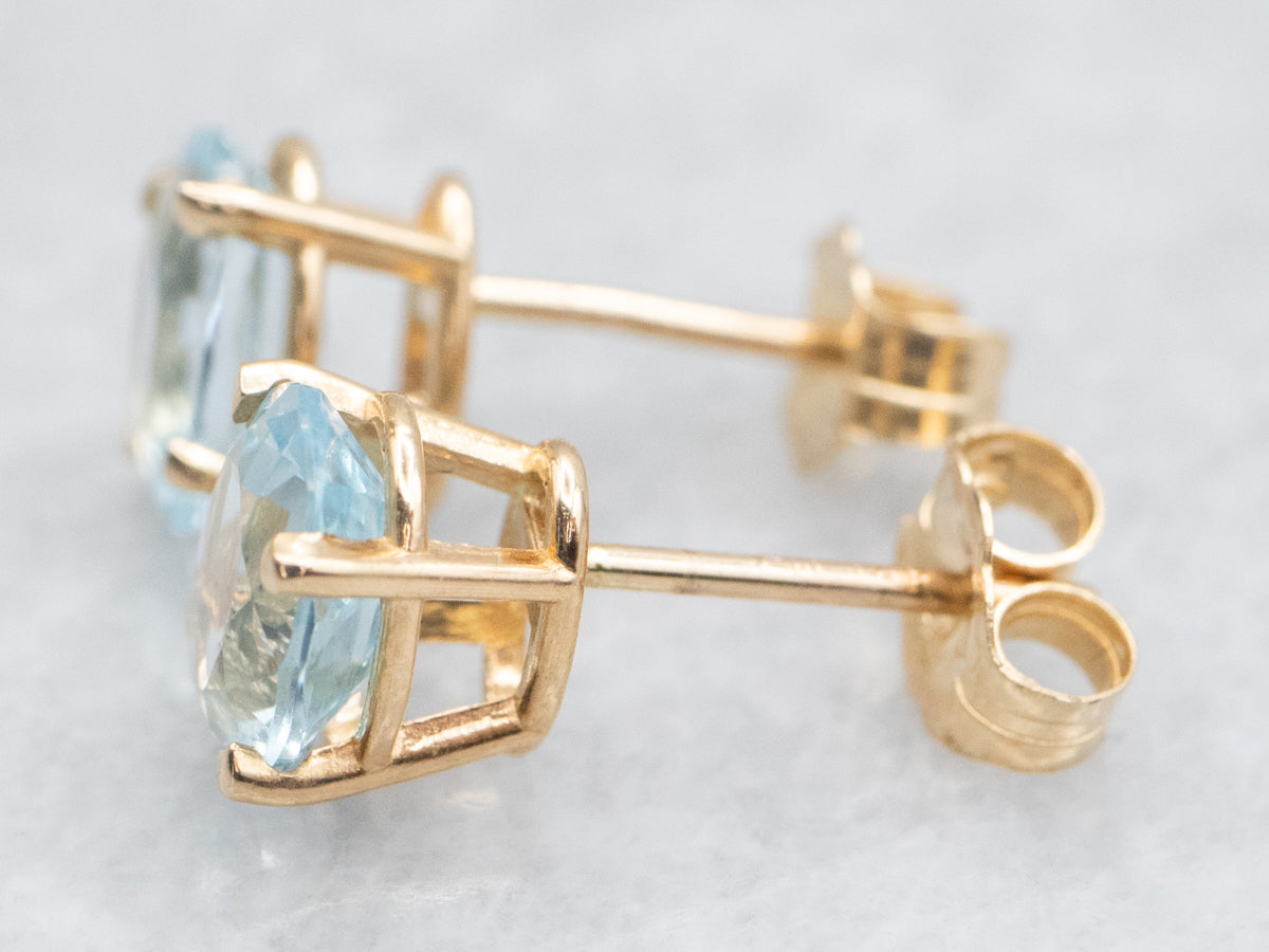 14K Yellow Gold Blue Topaz Stud Earrings