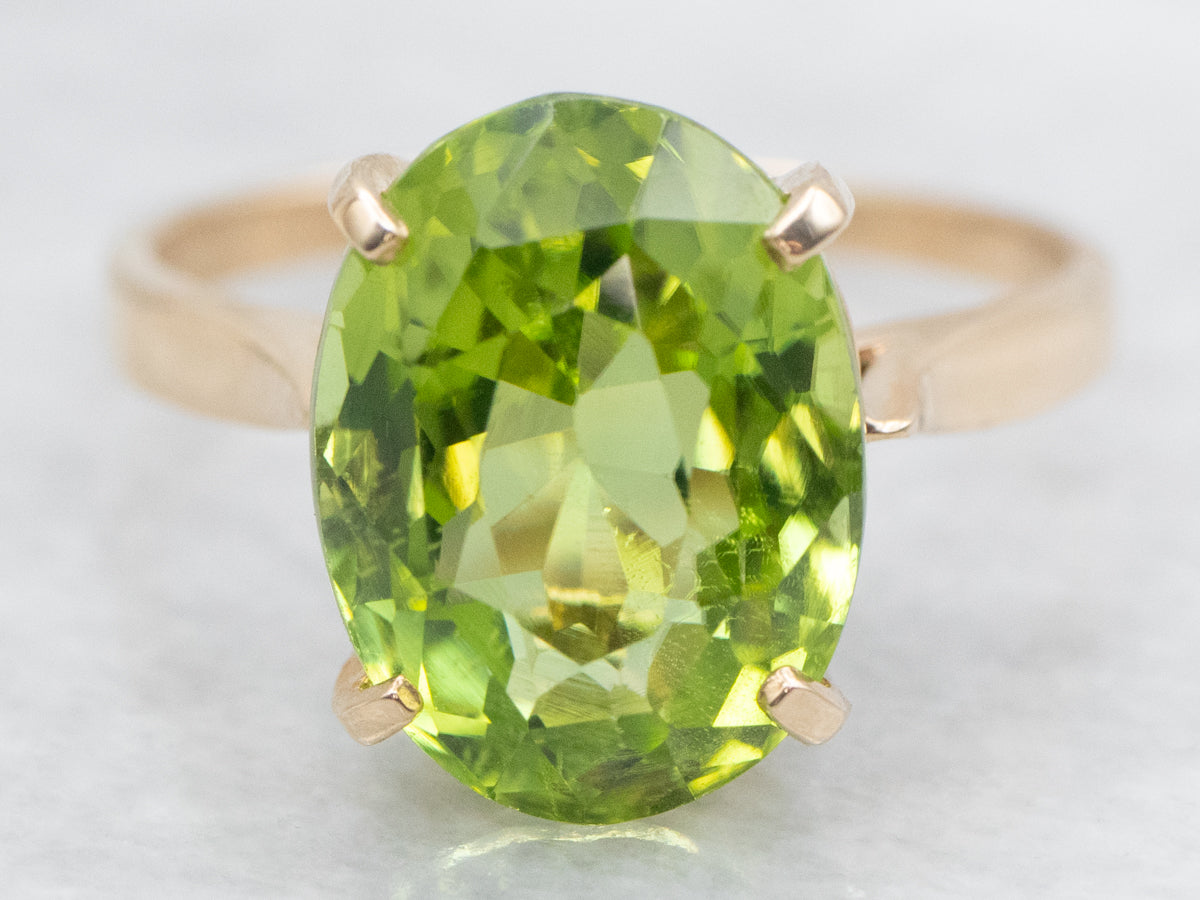 Peridot Solitaire Ring in Four-Prong Setting