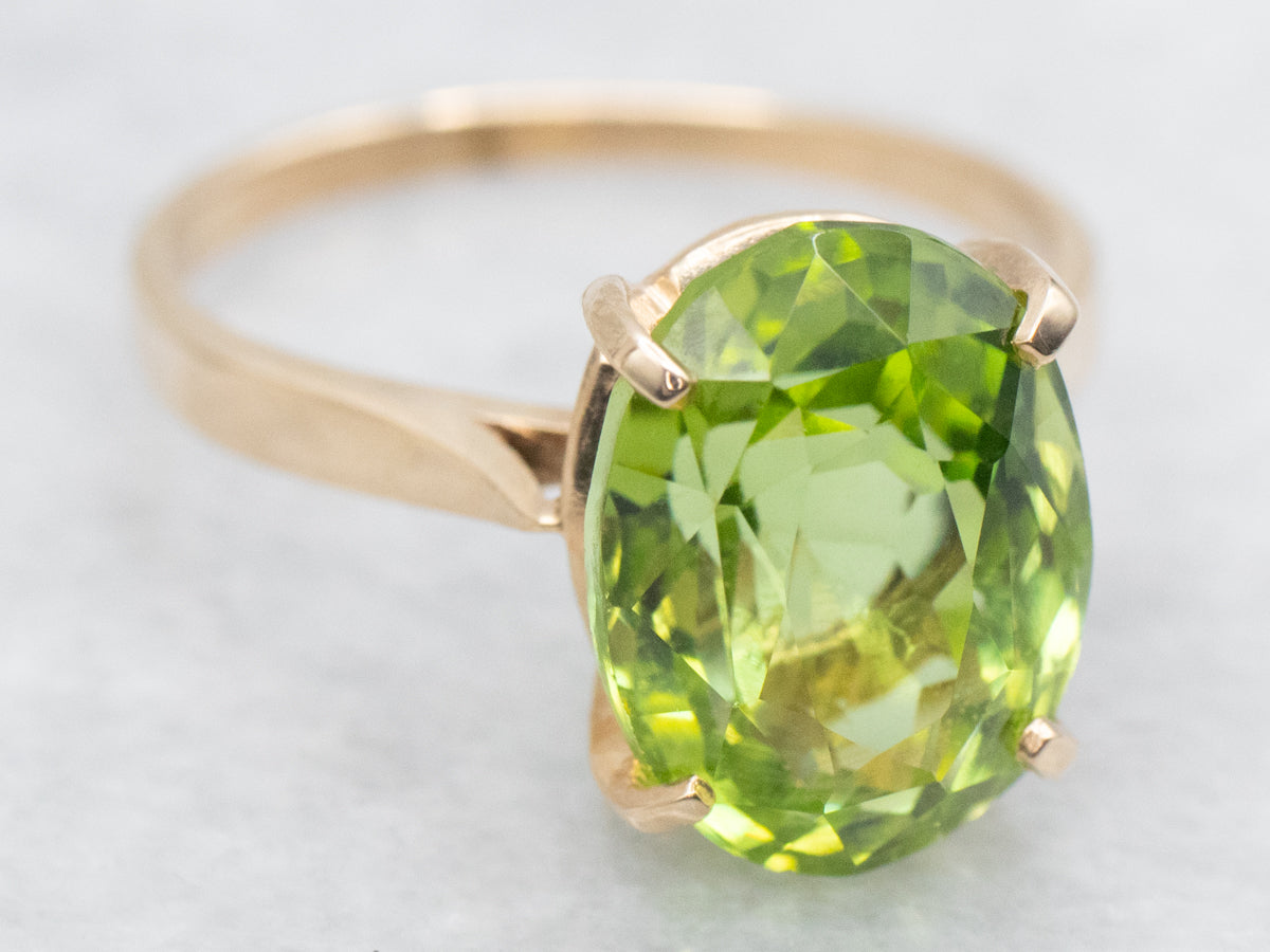 Peridot Solitaire Ring in Four-Prong Setting