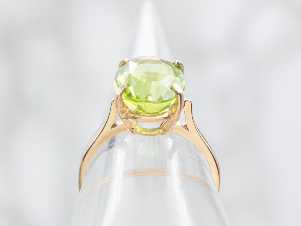 Peridot Solitaire Ring in Four-Prong Setting