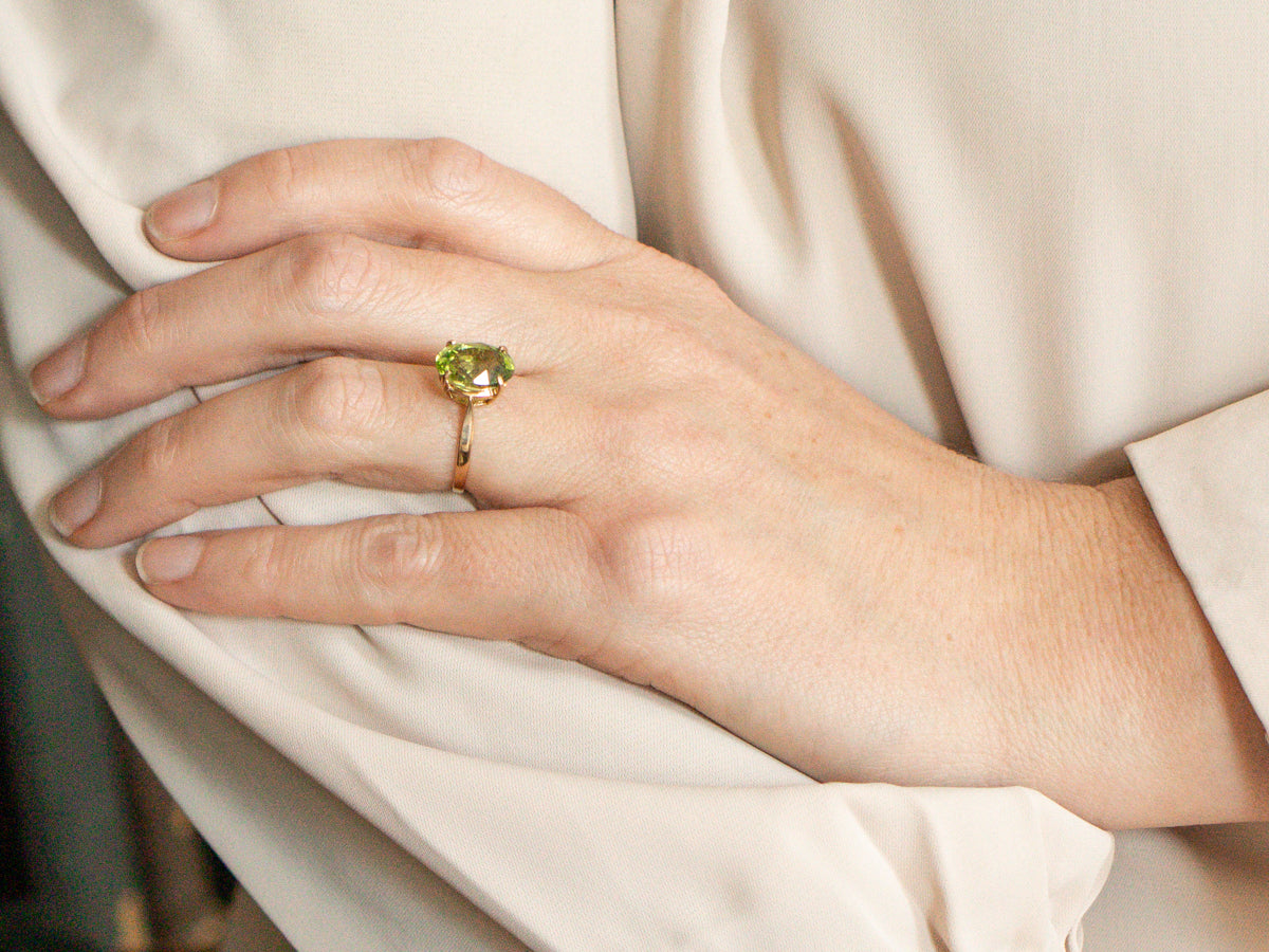 Peridot Solitaire Ring in Four-Prong Setting