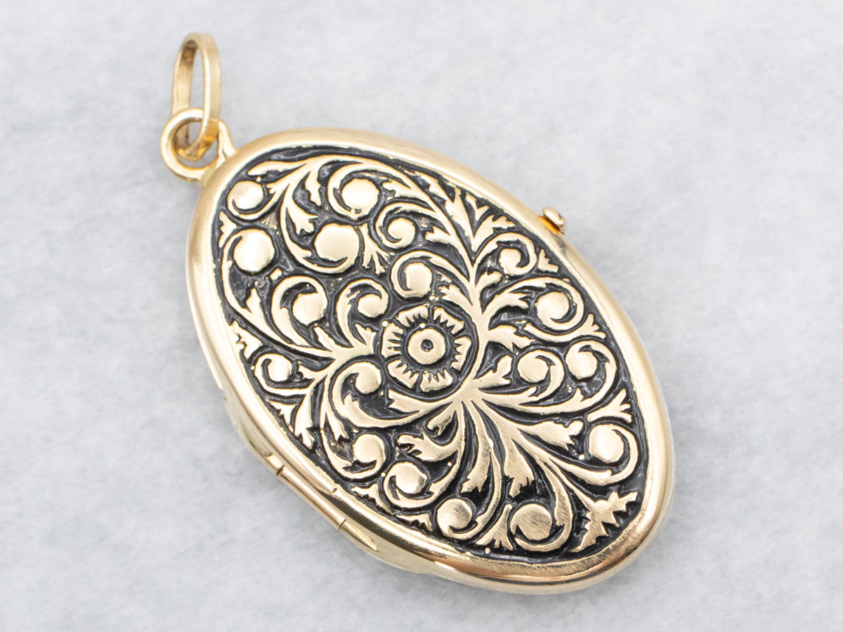 Oval 18-Kart Gold Locket with Scrolling Botanical Design