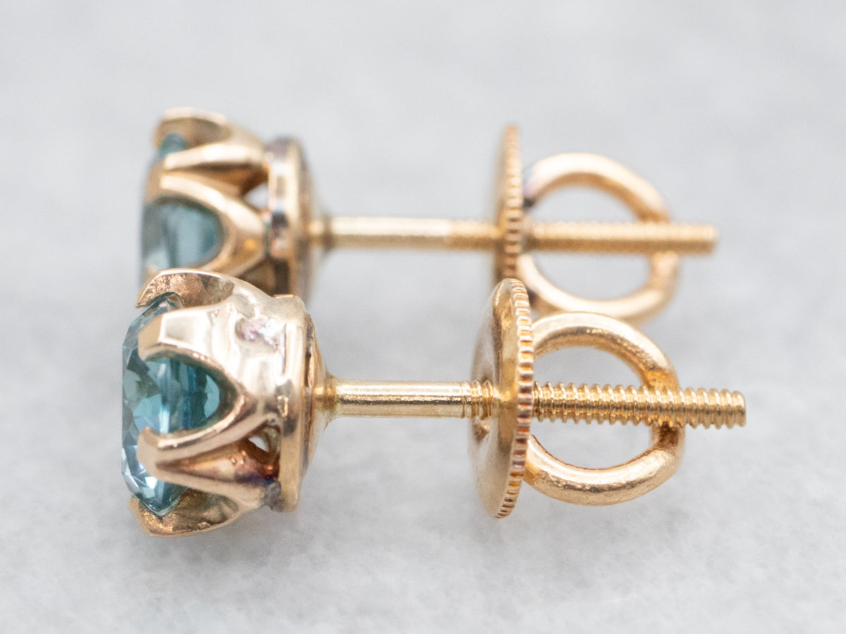 Screwback Blue Zircon Stud Earrings in Gold Buttercup Setting