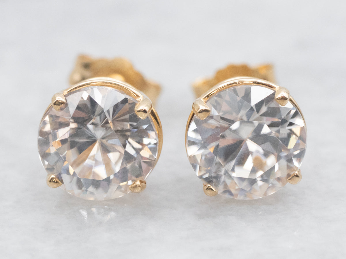 White Zircon Stud Earrings in Yellow Gold