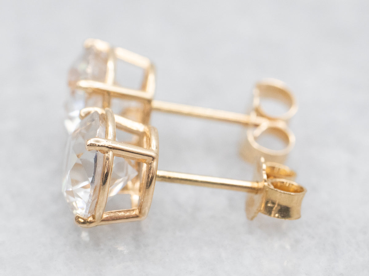 White Zircon Stud Earrings in Yellow Gold