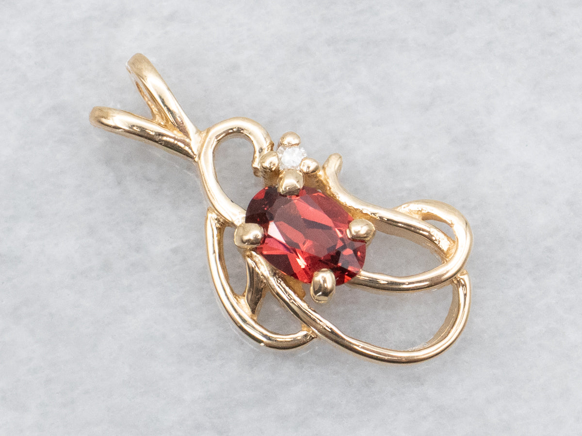 Scrolling Gold Garnet and Diamond Pendant