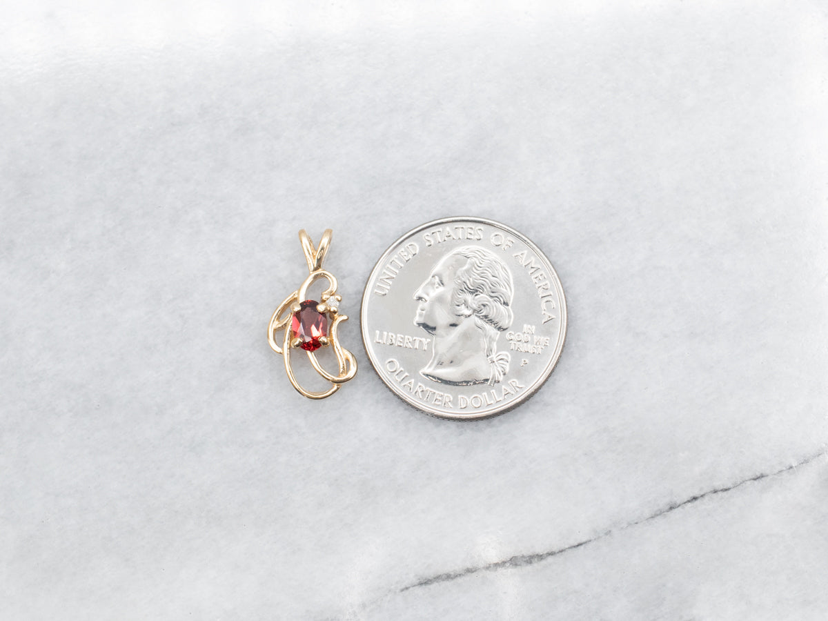 Scrolling Gold Garnet and Diamond Pendant