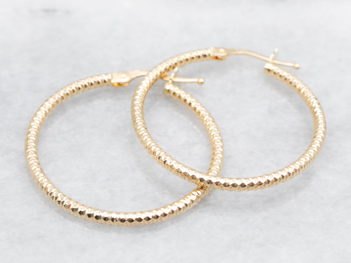 Faceted Gold Tube Hoop Earrings