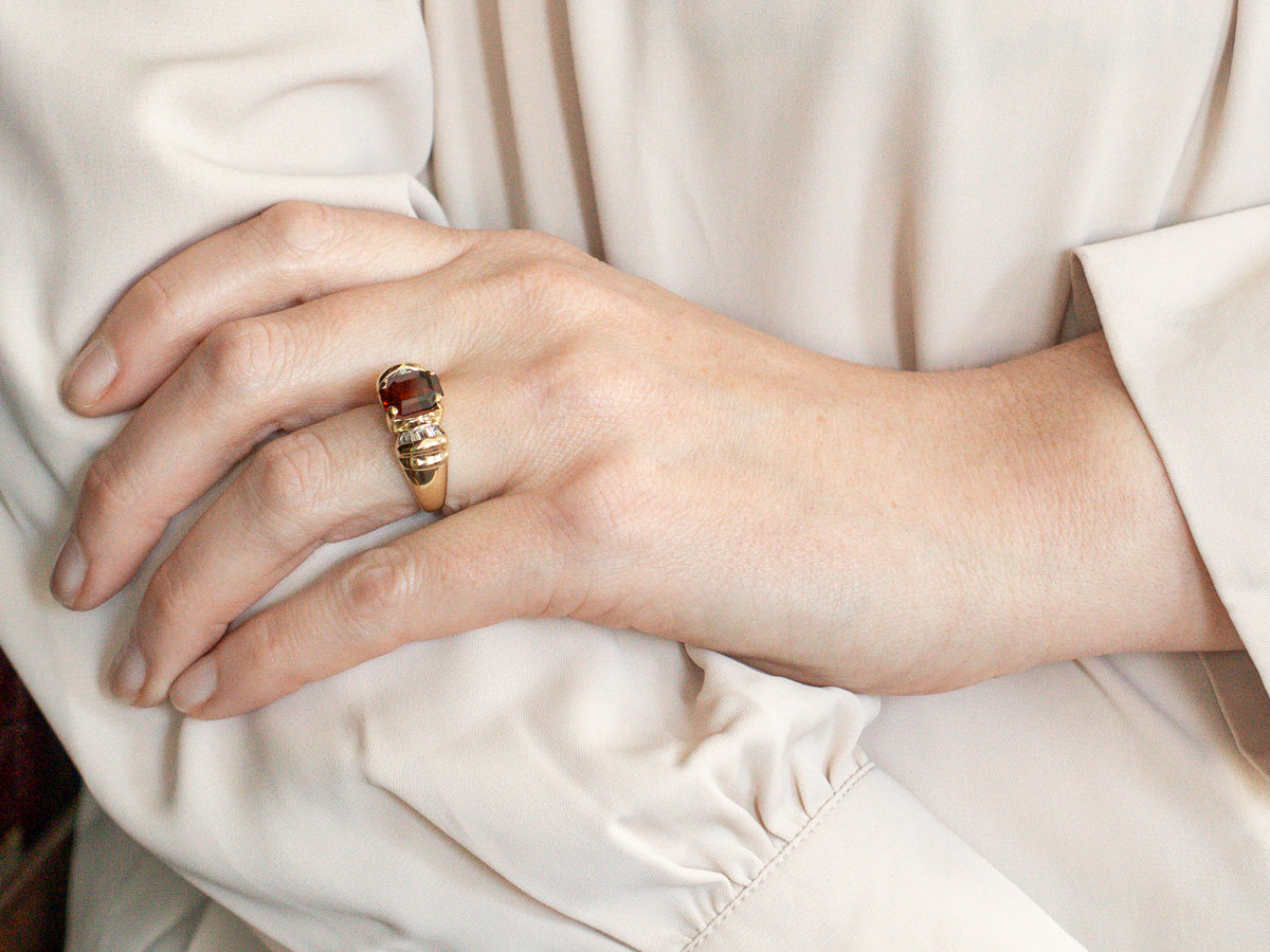 Modern Gold Garnet Cocktail Ring with Baguette Diamonds