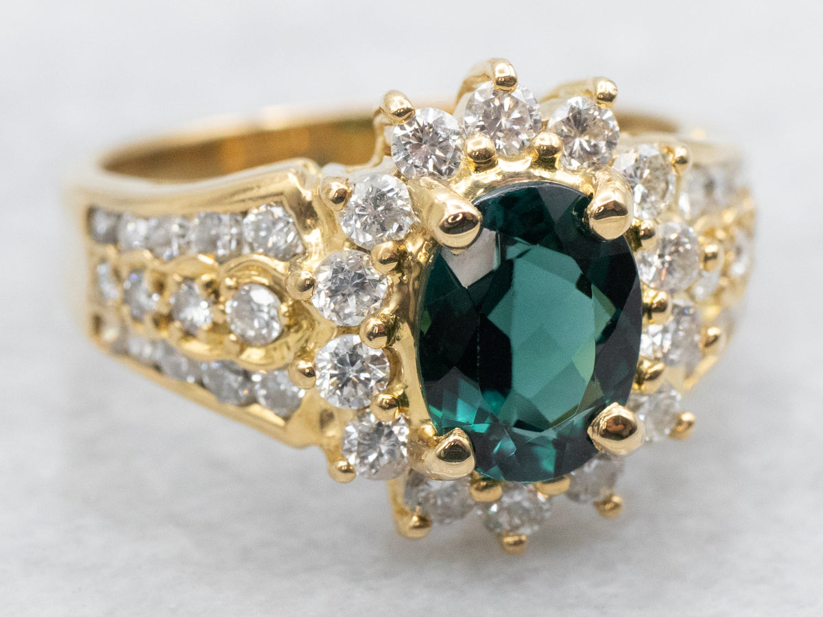 Modern Green Tourmaline and Diamond Halo Ring