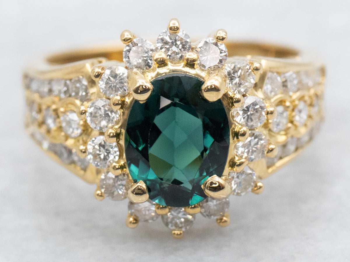 Modern Green Tourmaline and Diamond Halo Ring