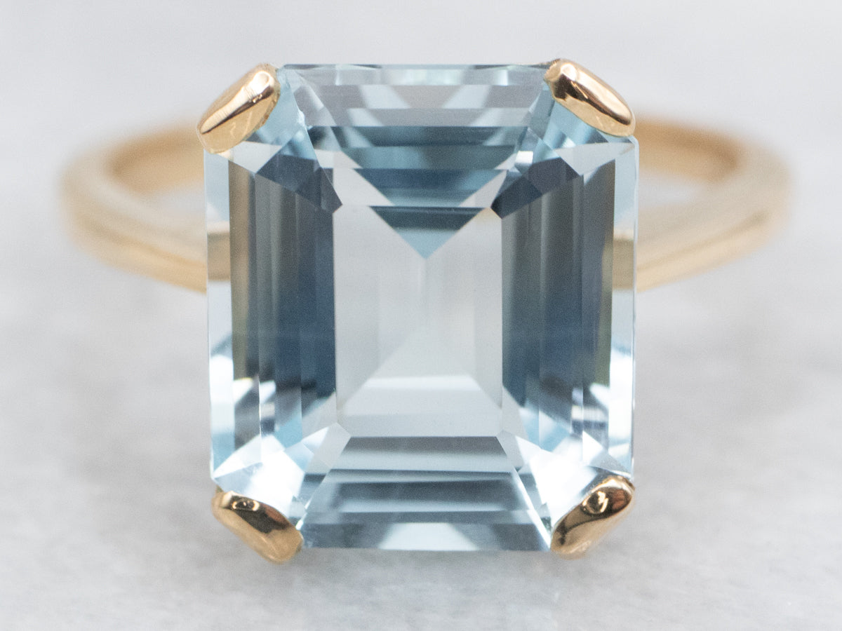 Yellow Gold Blue Topaz Solitaire Ring