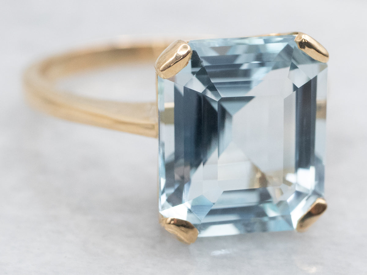 Yellow Gold Blue Topaz Solitaire Ring