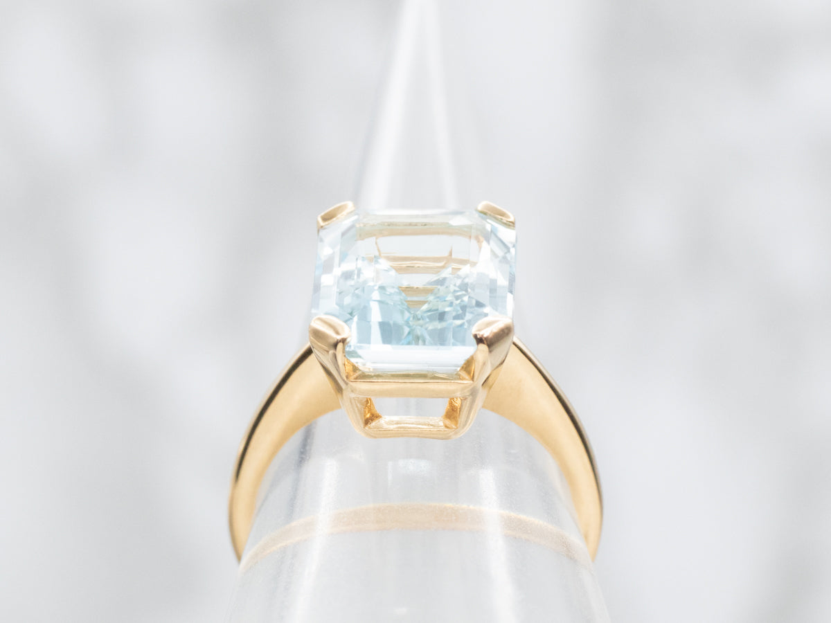 Yellow Gold Blue Topaz Solitaire Ring