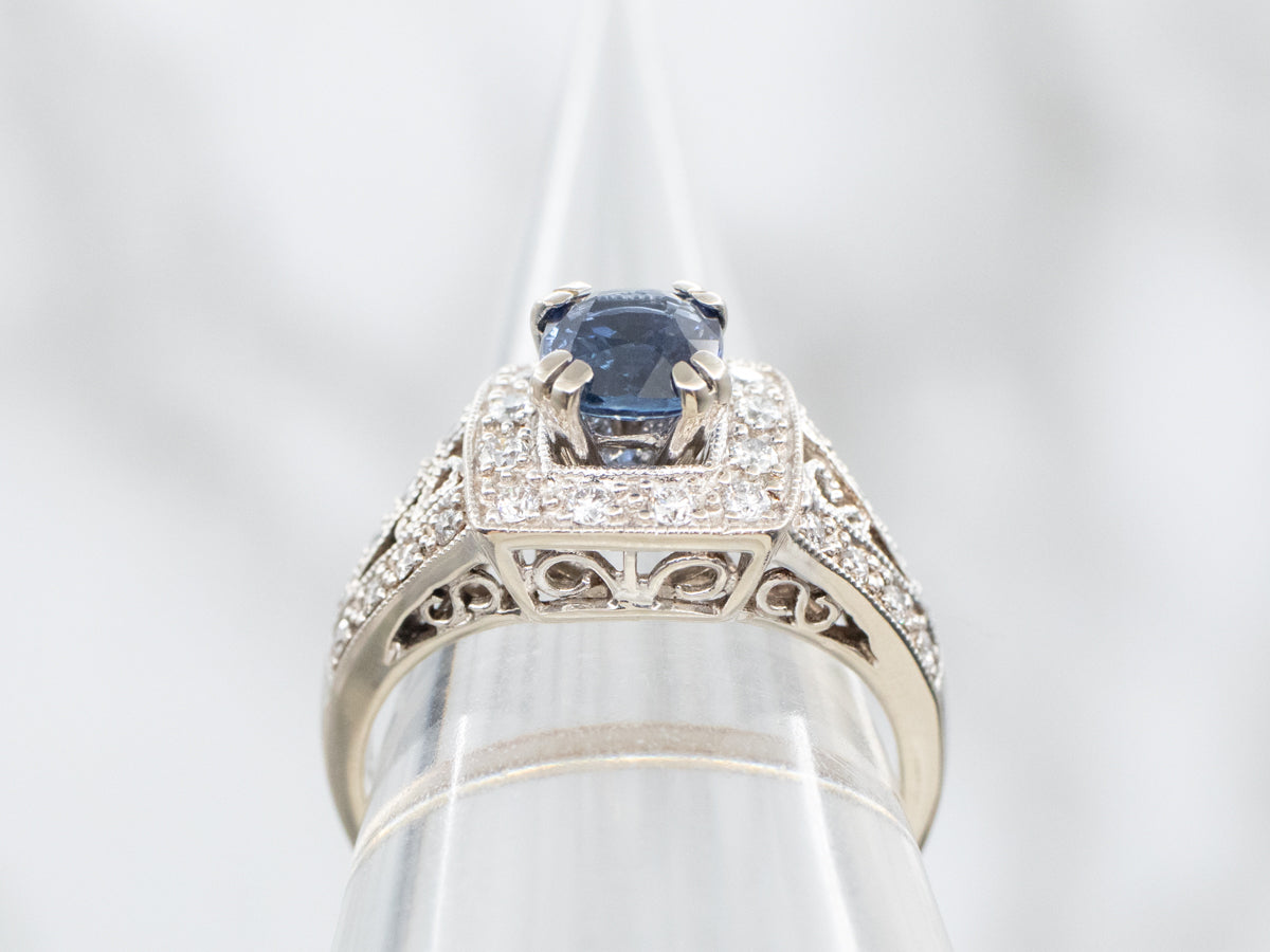 Modern White Gold Sapphire Engagement Ring with Diamond Halo