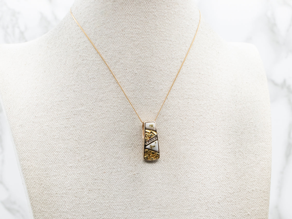 Diamond, Gold, and Oracal Quartz Pendant