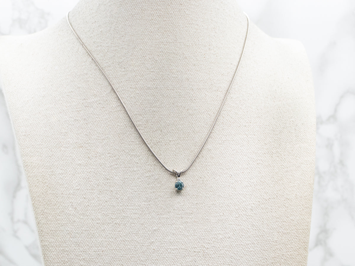 Blue Zircon and Diamond Pendant