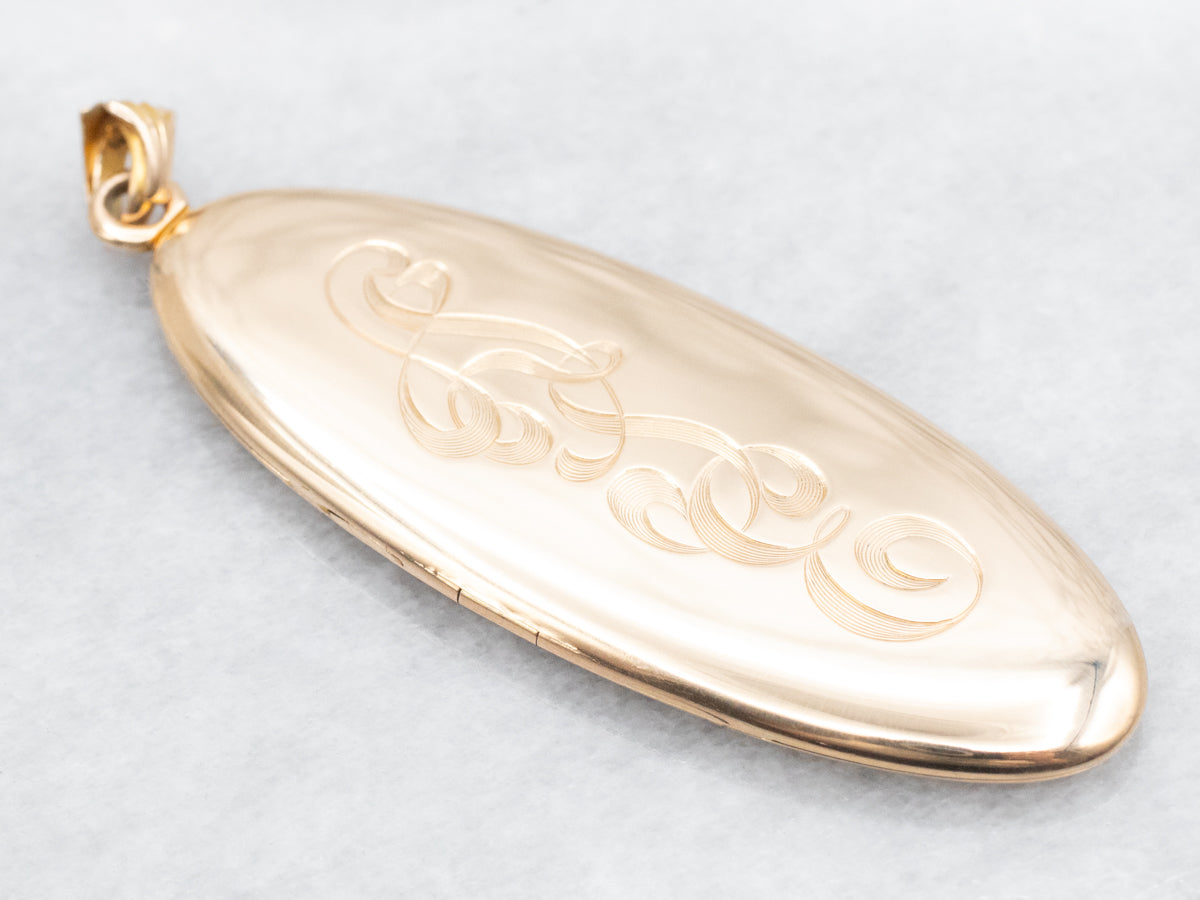 Gold "LSE" Engraved Elongated Oval Locket