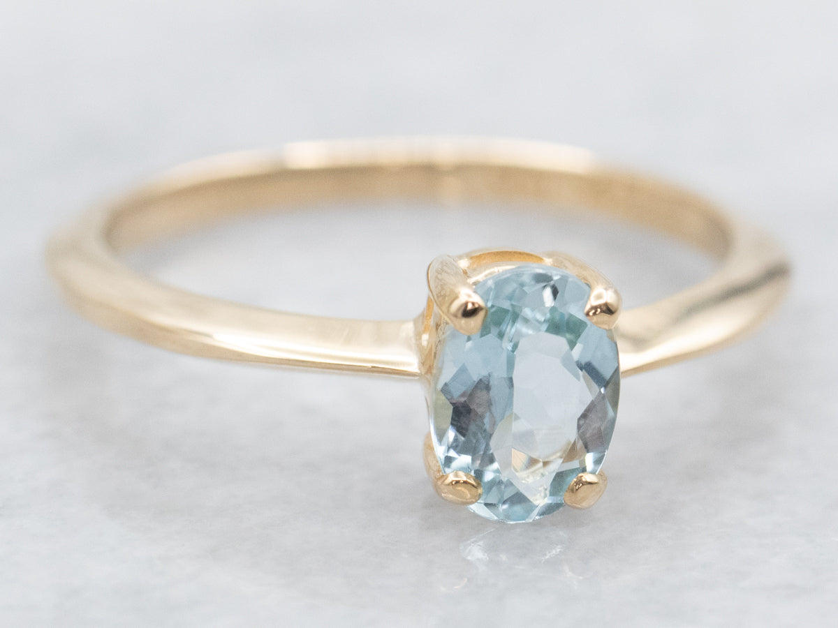 Simple Oval-Cut Aquamarine Solitaire Ring