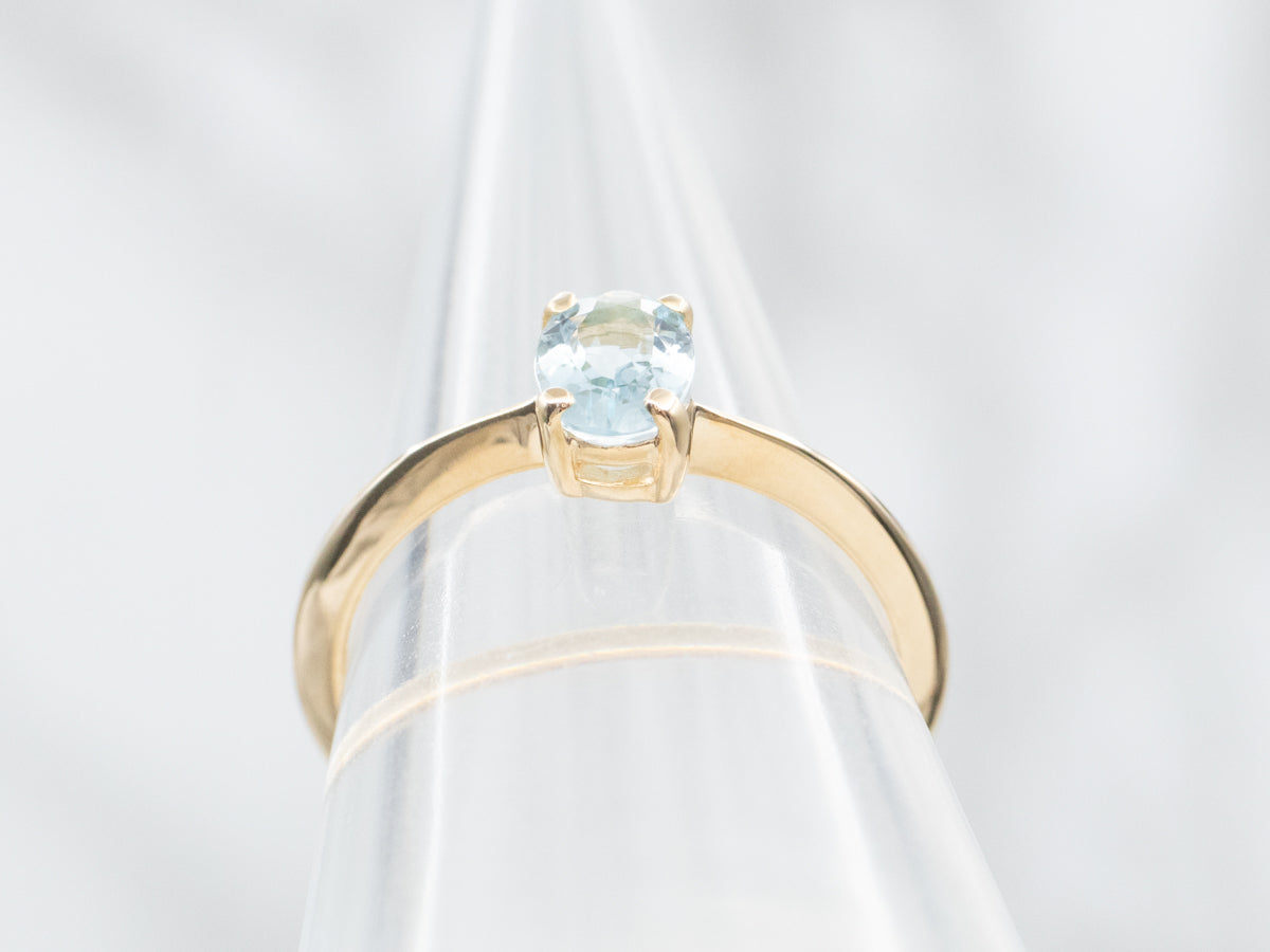 Simple Oval-Cut Aquamarine Solitaire Ring