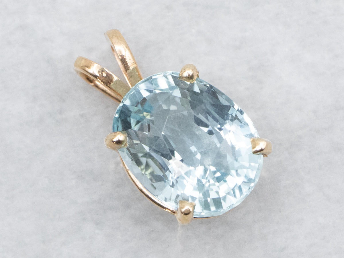 Simple Aquamarine and Gold Pendant