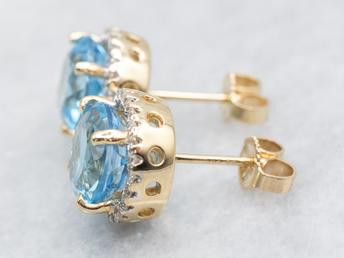 Yellow Gold Blue Topaz and Diamond Halo Stud Earrings